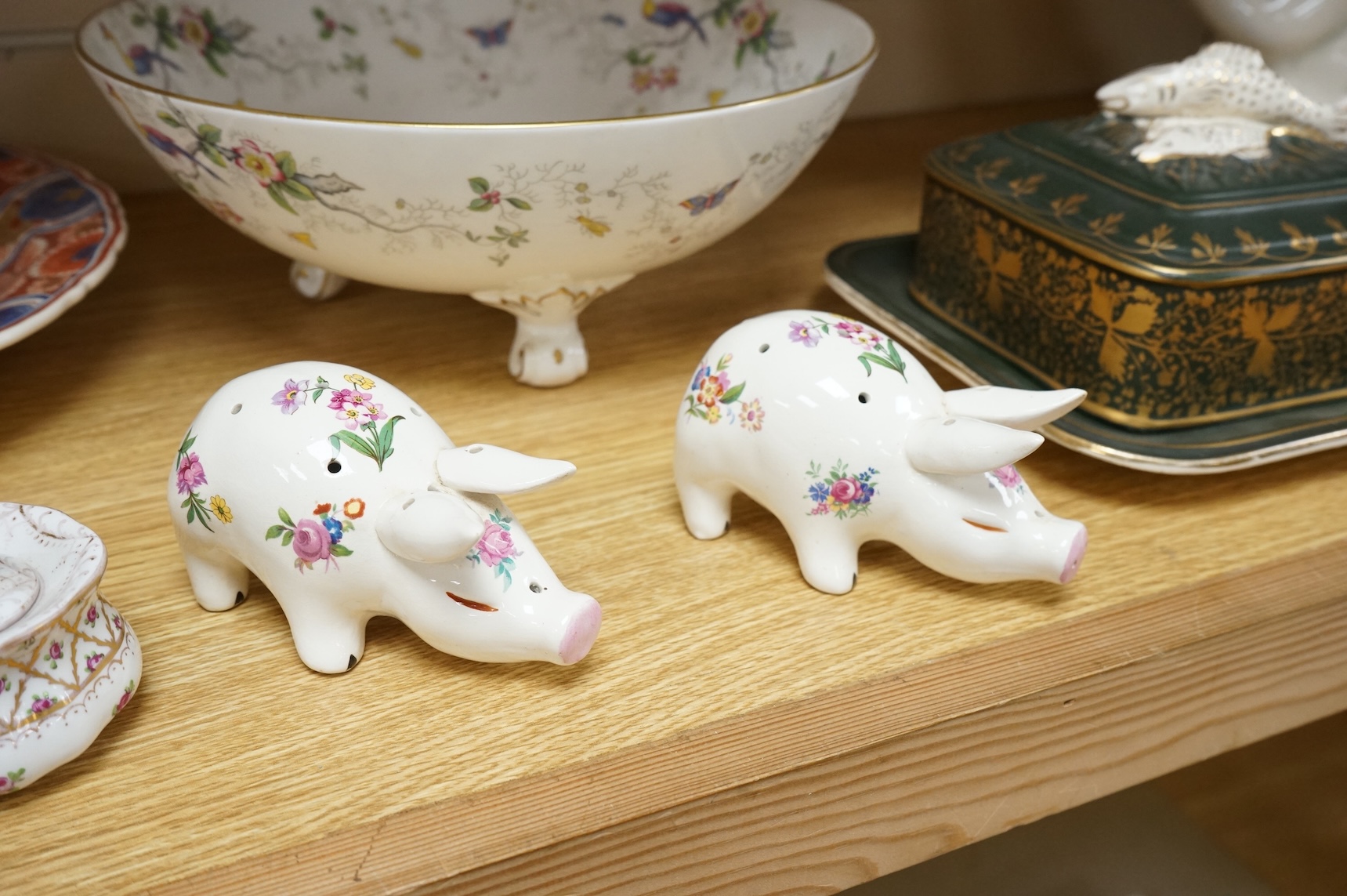 A collection of porcelain and pottery to include commemorative china, a leaf dish and group of wade figures, largest 29cm in diameter